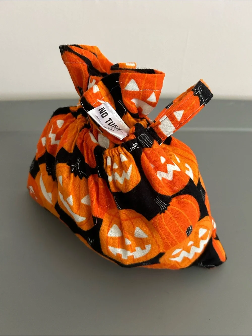 Pumpkin glow in the dark costume shopping cart liner with matching handbag